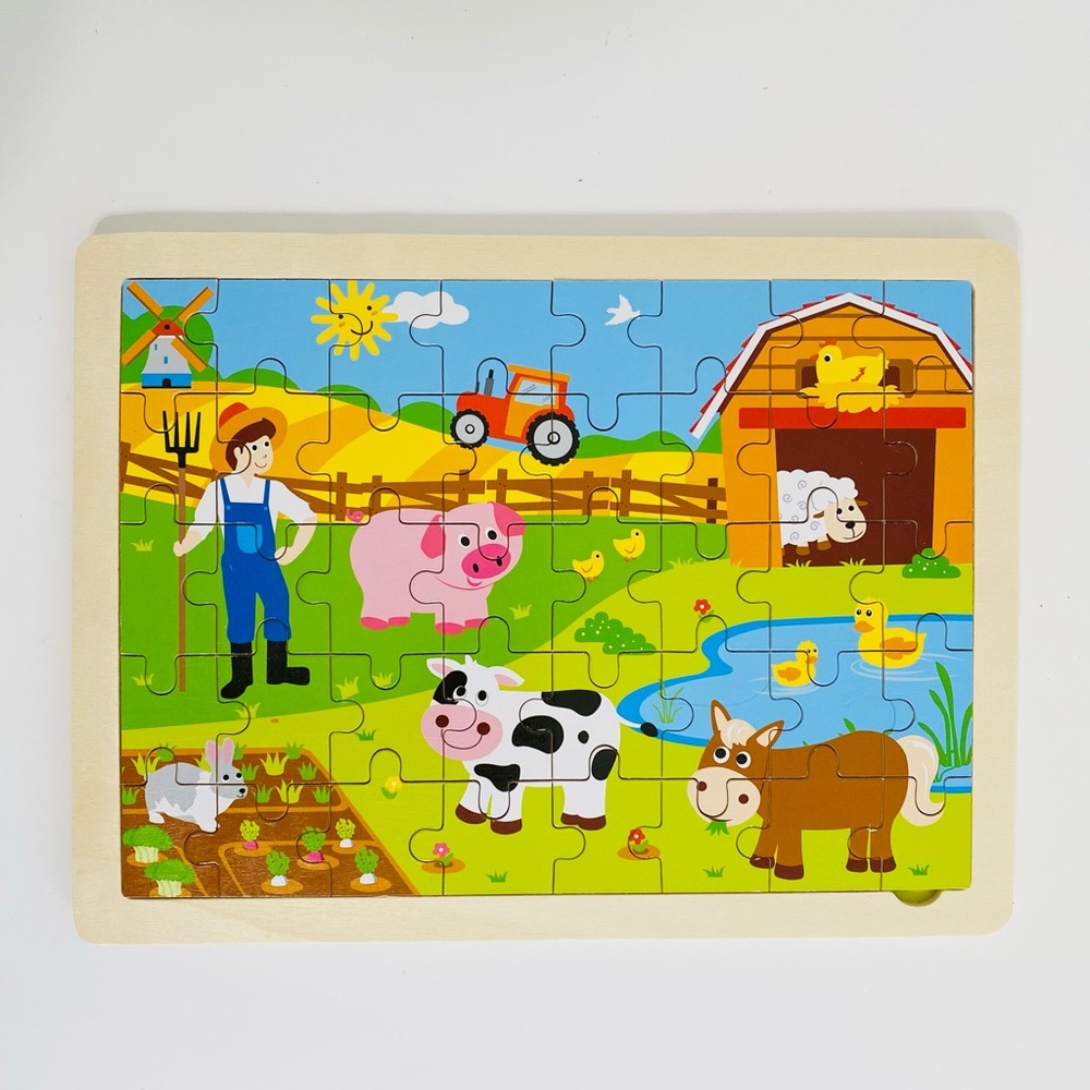 The Professor Poplar's Busy Barnyard Animals Inset Wooden Jigsaw Puzzle.